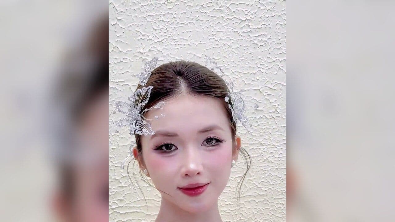 Kiểu tóc Búi trễ mái 5.5