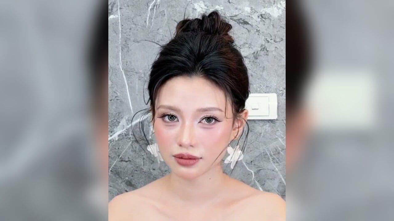 Kiểu tóc Búi cao - mái phồng xốp