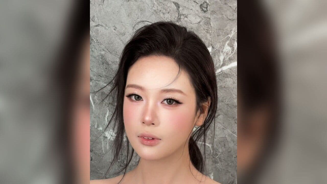 Kiểu tóc Cột trễ - mái 7/3 sợi bay