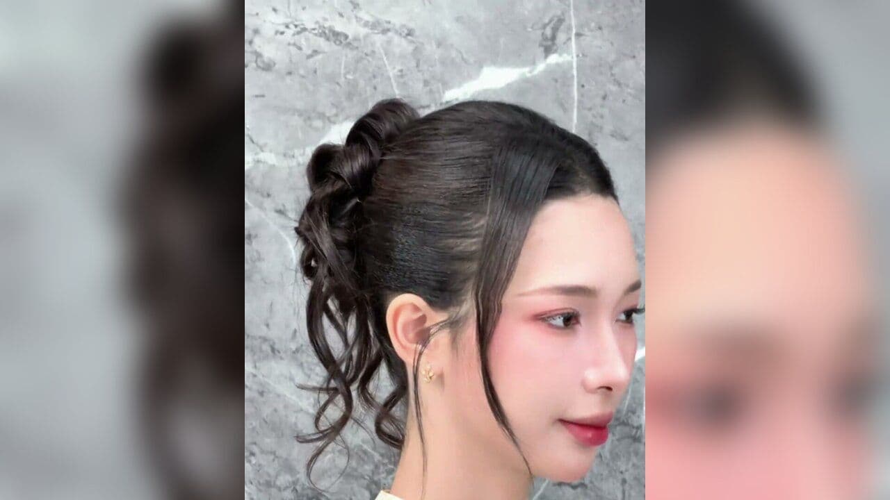 Kiểu tóc Búi lửng thả sợi cho mặt dài